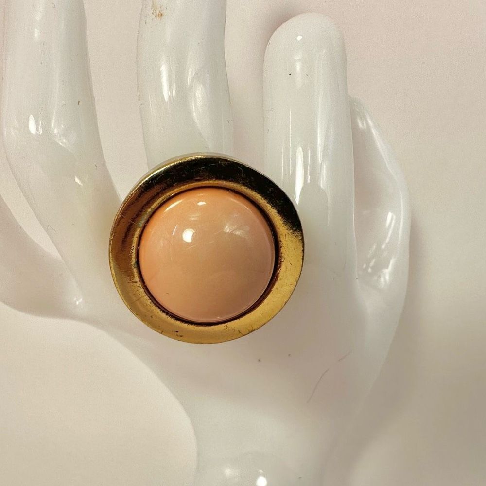 Gold tone and pink cocktail ring